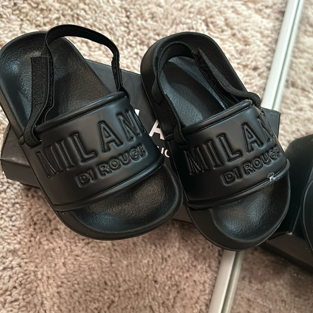 Never worn Baby slides